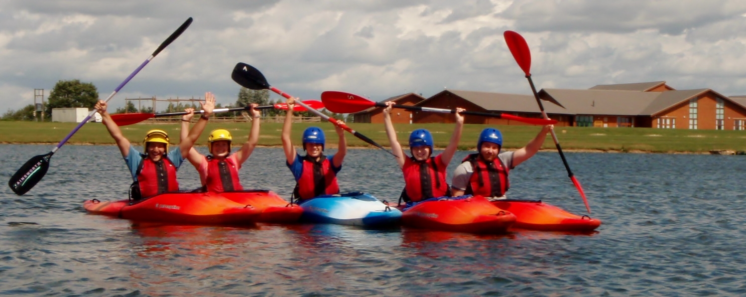 Kayaks in front of building.jpg